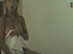 Lively chick looks so gorgeous after taking the shower! Her towel falls down and she stays nude previous to camera exposing flawless tiny boobs!