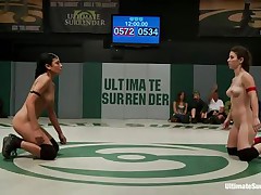 The match is intensive and it appears to be that the referee is looking somewhere else because things are going wild in the arena. These sluts don't know the meaning of fair play and a cutie comes in the aid of the other one. Looks like someone will need to surrender